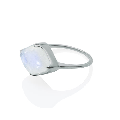 A side-view image of Juraster’s 9ct White Gold Rainbow Moonstone Ring, Talisman, crafted from Fairmined 9ct white gold and a hand-cut moonstone.