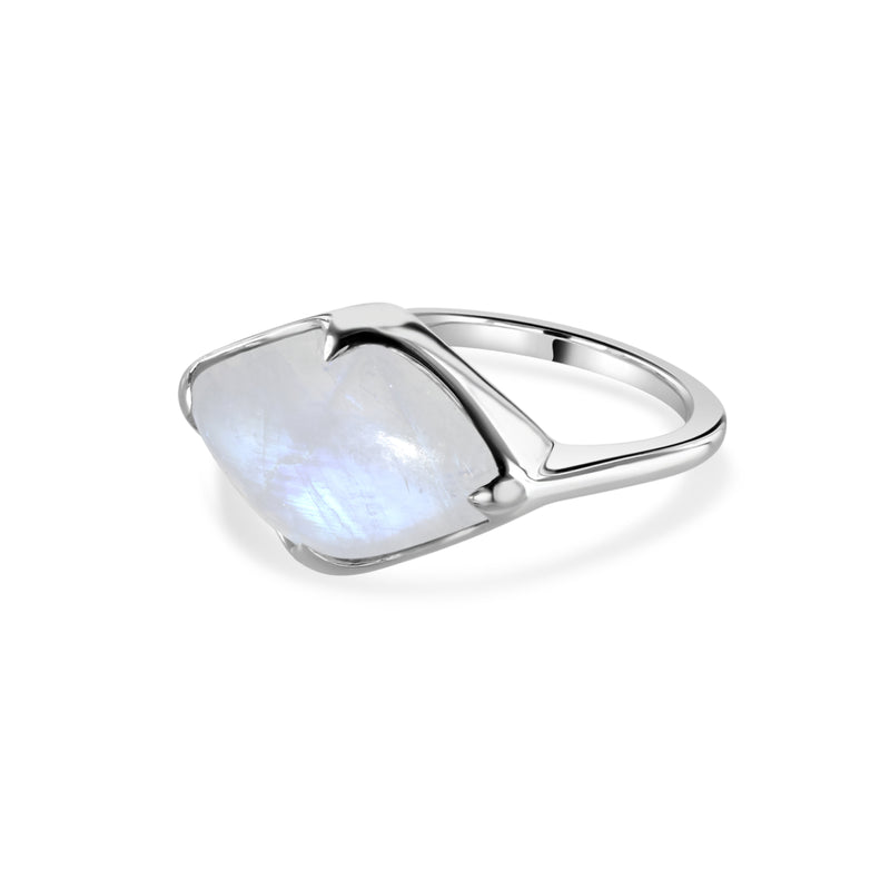 White gold ring with an iridescent white gemstone on a white background