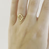 A video of a model wearing Juraster’s 9ct Gold Diamond-Shape Ring, Compass, crafted from Fairmined 9ct yellow gold.